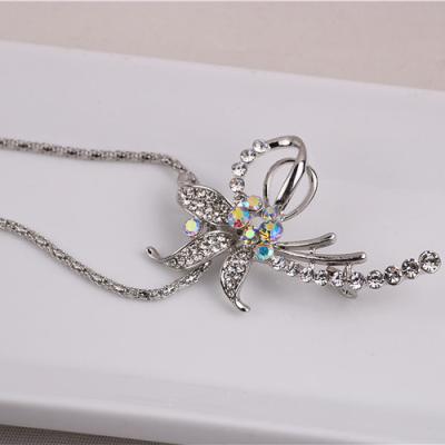 China Custom silver brooch high quality brooch modeling women's drill resin brooch decorative necklace brooch for sale