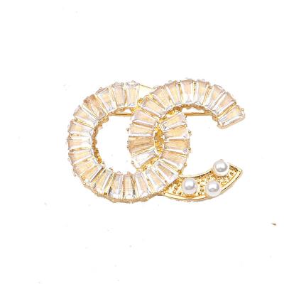 China Brand Style Ins Female Pin Inlaid Zircon Pearl Accessories European And American Luxury Fashion Apparel for sale