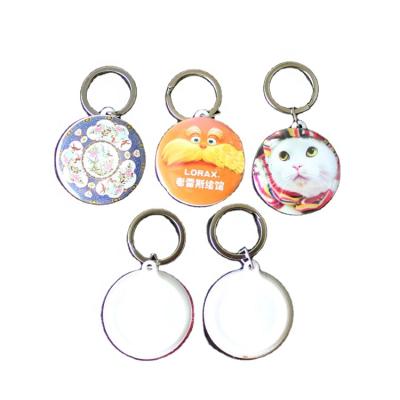 China Promotion Gift 44mm New Key Chain Blank Accessories Customized Advertising Gifts Personalized Sublimation Key Chain Badges Blanks for sale