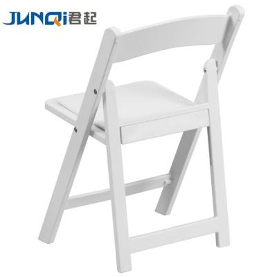 China Contemporary Wholesale Foldable Outdoor Wedding Plastic Resin White Folding Chair for sale