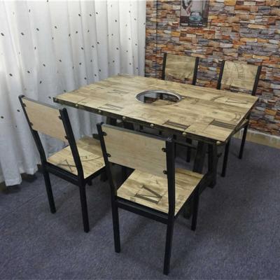 China Restaurant Foshan Factory Wholesale Wooden Dining Chairs Restaurant Rectangle Metal Hot Pot Table with Roman Numerals on Chipboard on Top for sale