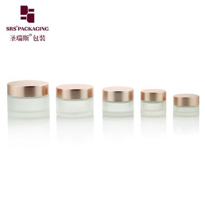 Cina 3g 5g 10g 15g 20g 25g Barattoli rotondi trasparenti ghiacciati con tappo in oro rosa per crema facciale Barattoli di vetro 10ml in vendita