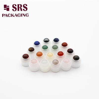 China portador de bolas de plástico redondas de piedras semipreciosas de colores pequeños con bola para botella de rollo en venta