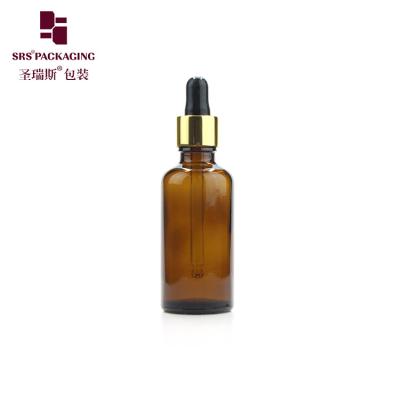 China 30ml 50ml amber round glass cosmetic essence bottle with dropper for sale