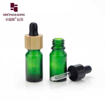 China 5ml in stock glass empty bamboo dropper small essential oil bottles for sale