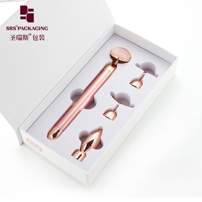 Cina imballaggio cosmetico di lusso giada massaggio testa vibratore elettrico beauty bar in vendita