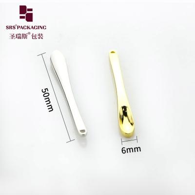 China Fabricante de fábrica lujo lindo brillante personalización crema cosmética cuchara de oro en venta