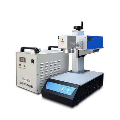 China 355 nanometer glass crystal quartz laser engraving machine water cooled spotting UV laser printer for glass plastic board en venta