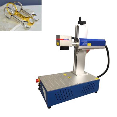 China Portable Deep Marking Laser Machine 30w Marking Laser Machinery Fiber Laser Marking Machine 50w en venta