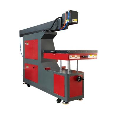 China Water-cooled woood paper engraving and cutting CO2 laser engraving plastic wood leather spotting machine en venta