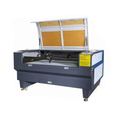 China Water Cooled 1390 1490 CO2 80W Laser Cutting Machine And Engraving Machine en venta