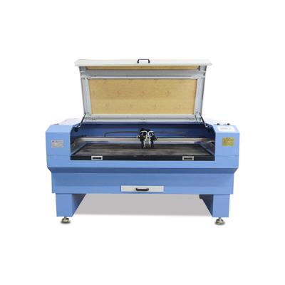 China laser cutter 100 watt co2 laser cutting machine and engraving machine en venta