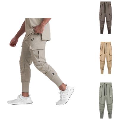 China Wholesale Custom QUICK DRY Custom Gym Men's Blank Trouser Stretch Pants Slim Fit Sport Running Sporty Men's Tracksuit for sale