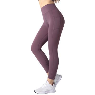 China Breathable High Quality Girls Yoga Pants Solid Color High Waist Quick-drying Fitness Clothing Yoga Pants Customized Leggings With Logo for sale