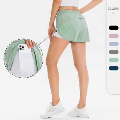 China Breathable Spandex Nylon Sweat Shorts Dress Compression Abbreviations Quick Dry Women Yoga Shorts With Pocket for sale