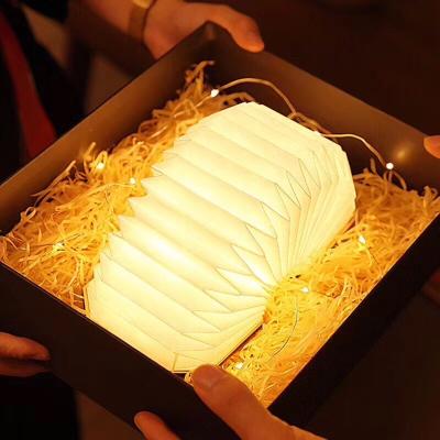 China Foldable custom wood folding book light tyvek paper book lamp for sale