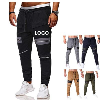 China QUICK DRY Customize Fashion Sports Solid Color Pants Multi Pocket Plus Size Men Casual Cargo Pants With Zipper for sale