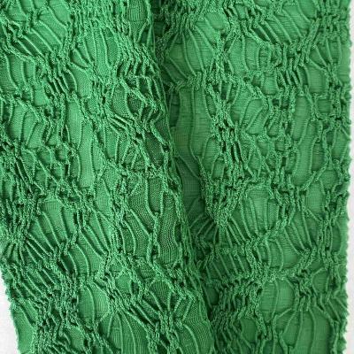 China Hot Sale Customized Color Light Transmission Tear-Resistant Jacquard Knit Spandex Pleated Polyester Fabric For Skirt for sale