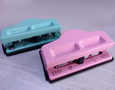 China Macaron T Shape Colors Office Supplies Metal Sheet Mushroom Paper Labor Saving Hand Punch for sale