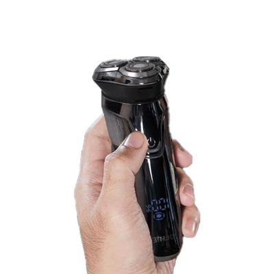 China Tras Makinesi Triple Blade Shaving Machine Men Mini Trimmer Barbeador Afeitadora 4D Electric Razor for sale