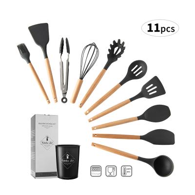 China Viable Wooden Handle Heat Resistant Silicone Spatula Set 11pcs Cooking Tools Silicone Kitchen Cookware Set With Rack for sale