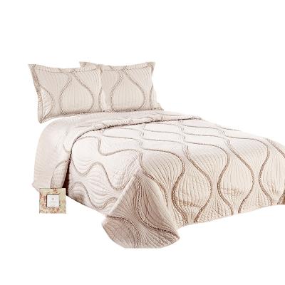 China Embroidery Quilted Bedspread Anti-static Luxury Hot Sale Bedding Set Sheets With Wave Shape Ruffles Quilting Comforter for sale