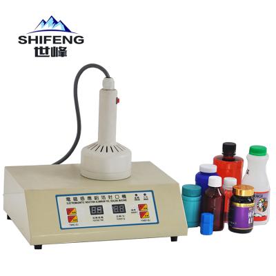 China Food Induction Honey Aluminum Foil Film Sealer Plastic Jars Bottles Sealing Machine for sale