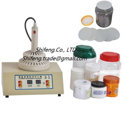 China SF-1000 Plastic Food Heat Sealer Jar Induction Sealing Machine for sale