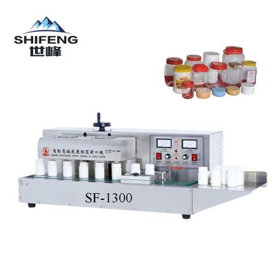 China SF-1300 Automatic Food Induction Bottle Sealing Machine for Aluminum Foil (M) for sale