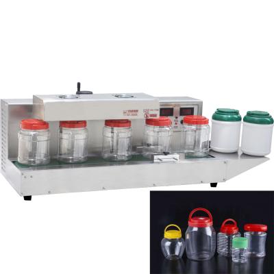 China Guangzhou Shifeng SF-1800 Food Bottle Induction Sealer Large Size Aluminum Foil Sealing Machine for sale