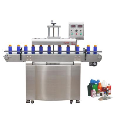 China Automatic Beverage Bottle Foam Sealer Cap Aluminum Foil Fruit Juice Plastic Bottles Jars Sealing Machine for sale