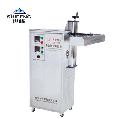 China SF-2000 Automatic Continuous Food Induction Bottles / Jars Sealer Sealing Machine for sale