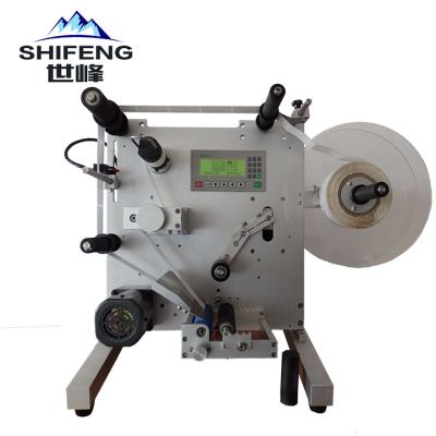 China SF-150 semi automatic food sticker label jars round bottles labeling machine for sale