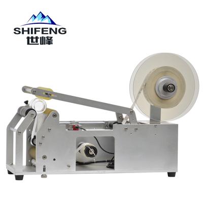 China SFYT-1 Semi-automatic Food Table Top Labeling Machine for Plastic Round Bottles for sale