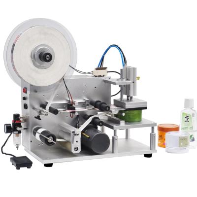 China Beverage Square Semi-automatic Flat Bottle Labeling Machine With Foot Pedal for sale