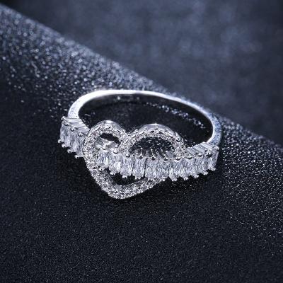 China Hot Selling Lasting Crystal Zircon Silver Wedding Ring Heart Engagement Rings For Female for sale