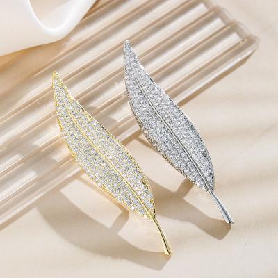 China OEM New Durable Fashion Feather Leaf Brooches Available Gold Plated Crystal Zircon Brooch Pin Women Men Jewelry for sale