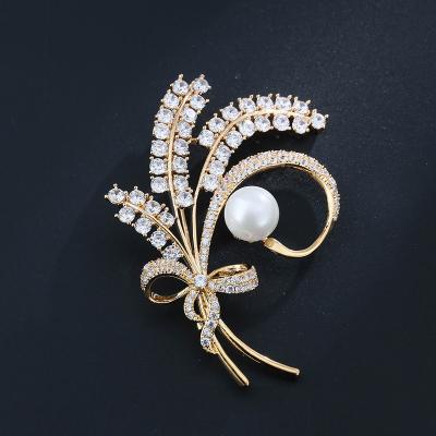 China Durable Hot Selling Luxury Wedding Rhinestone Brooch Pin Pearl Bow Tie Bridal Brooches Bouquet for sale