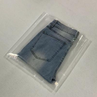 China BIODEGRADABLE custom printed self adhesive heat seal opp bag packing plastic bag for jeans for sale