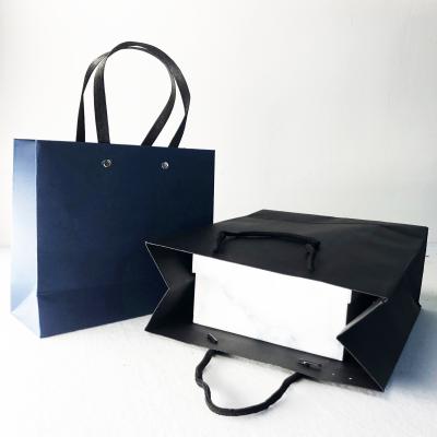 China Custom Eco Friendy Gift Luxury Matte Black Paper Material Simple Shopping Paper Bag With Logo Printing for sale