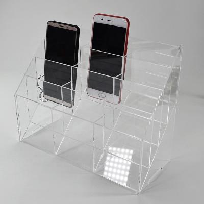 China Eco-friendly New Design Cell Phone Stand Clear Acrylic Display Holders for sale