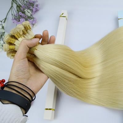 China Handtied Virgin 100 Silky Straight Hair Extension Russian Weft European Raw Wholesale for sale