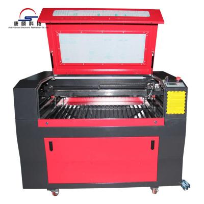 China Laser Engraving 60w 80w Desktop CO2 Mini Laser Engraving Machine For Small Size Portable Bamboo Cloth Rubber for sale