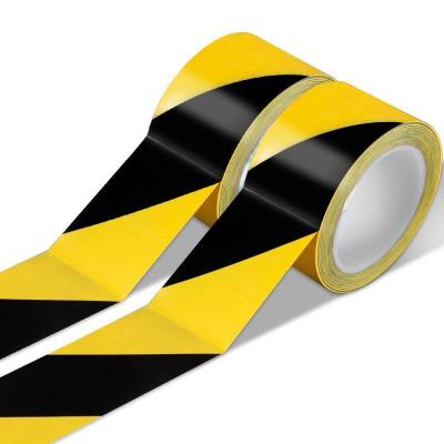 China PVC Warning Danger Tape Yellow Adhesive Barricade Caution PVC Tape Roll for sale