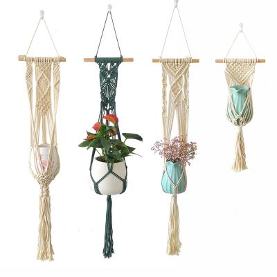 China New Nordic Minimalist Hand - Woven Tapestry Cotton Rope Basket Plant Decoration Net Bag Tassel Decoration Hanging Potted Wall Hanging for sale