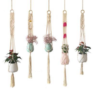 China Wholesale Minimalist Flowerpot Wall Hanging Plant Basket Macrame Rope Plant Hanger Family Garden Balcony Decoration Plant for sale