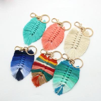 China New Trendy Handmade Yarn Woven Key Chains Cotton Feather Tassel Tassel Fashion Bags for sale