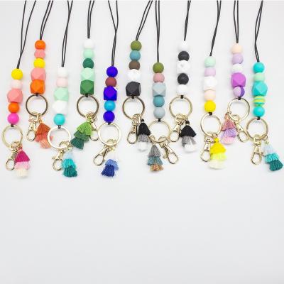 China New Modern Silicone Bead Tassel Arming Rope Necklace Work Card Student ID Key Chain Pendant Key Ring for sale