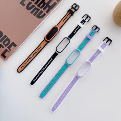 China Fabric Fashion Color PC Stitching Frame Integrated Silicone Watch Band For Xiaomi MI Band 6/5/4/3 for sale