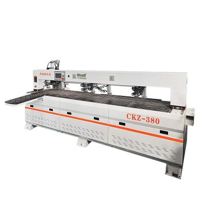 China Hotels MINGD CKZ-380 five surface triple spindle full automatic boring machine cnc side hole drilling machine for cabinet plywood make for sale